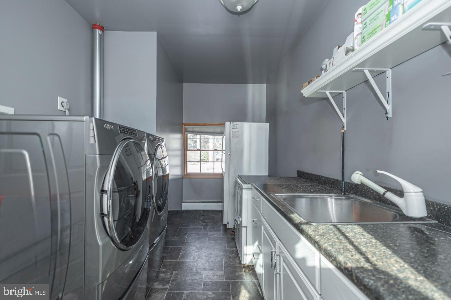 612 Double Woods Road Langhorne, PA 19047 - Photo 32 of 44 a utility room with dryer and washer