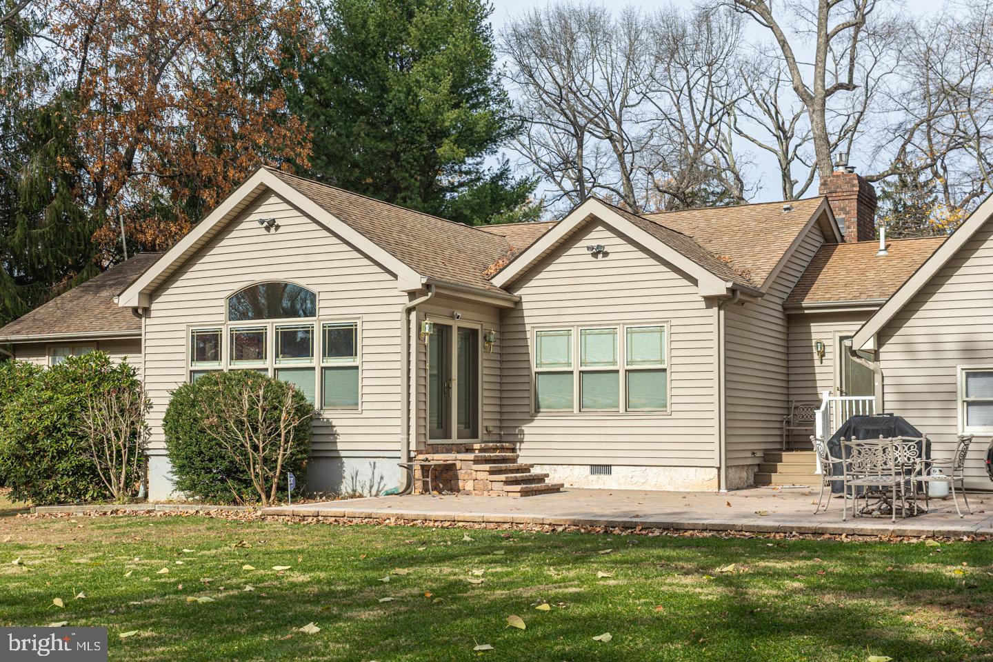 612 Double Woods Road Langhorne, PA 19047 - Photo 38 of 44 a front view of a house with a yard and garage