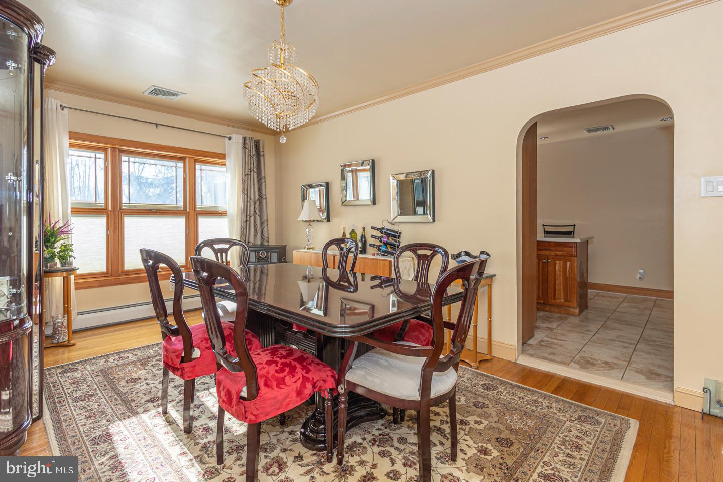 612 Double Woods Road Langhorne, PA 19047 - Photo 9 of 44 a view of a dining room with furniture window and wooden floor
