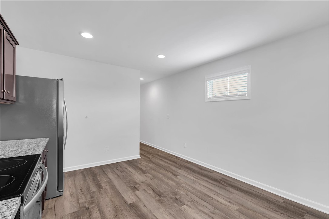 215 Royal Way Pendleton, SC 29670 - Photo 11 of 31 This bright kitchen offers a practical layout with durable flooring and essential appliances.