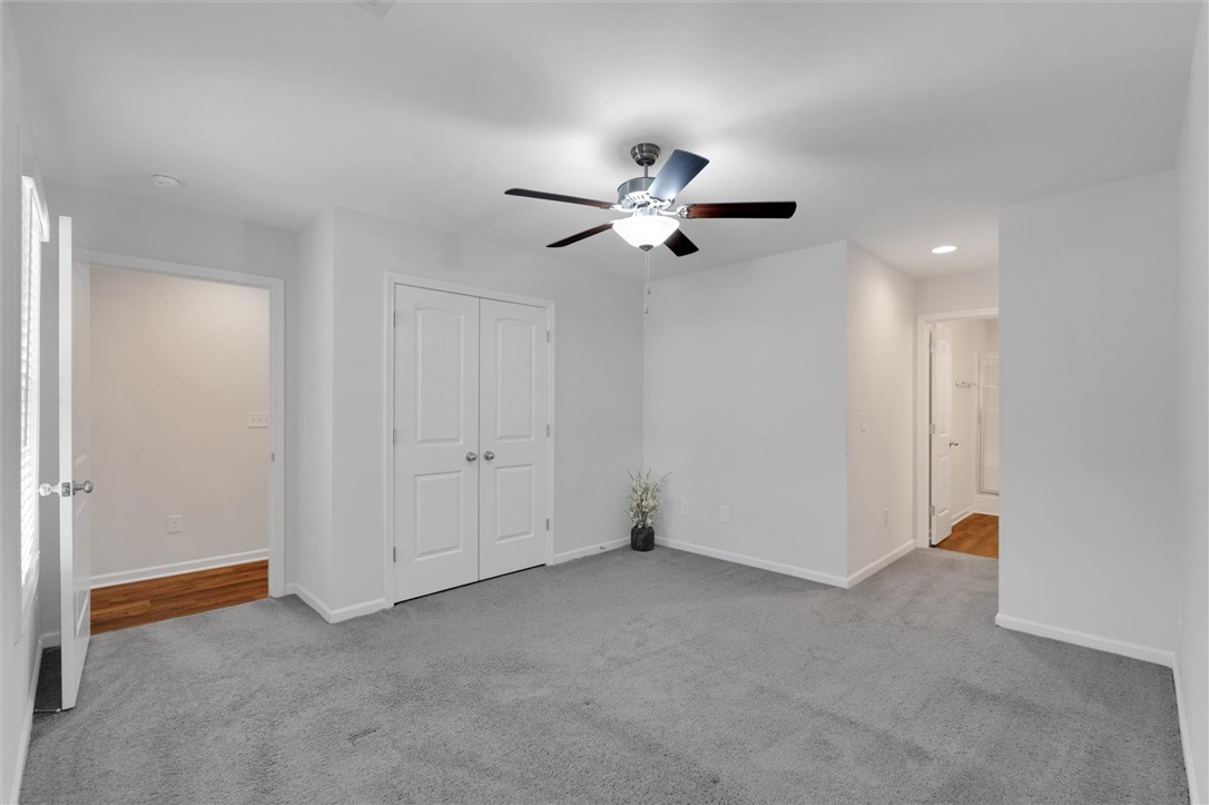 215 Royal Way Pendleton, SC 29670 - Photo 14 of 31 This spacious bedroom offers ample natural light and a soothing atmosphere.