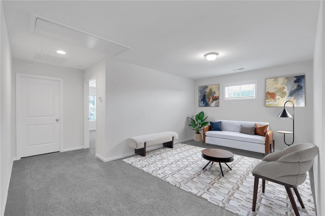 215 Royal Way Pendleton, SC 29670 - Photo 17 of 31 This versatile bonus room offers abundant space for leisure and creative pursuits.