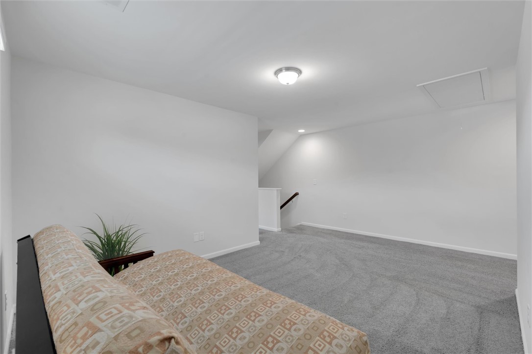 215 Royal Way Pendleton, SC 29670 - Photo 19 of 31 This versatile loft room offers ample space, perfect for recreation, relaxation, or productive endeavors.