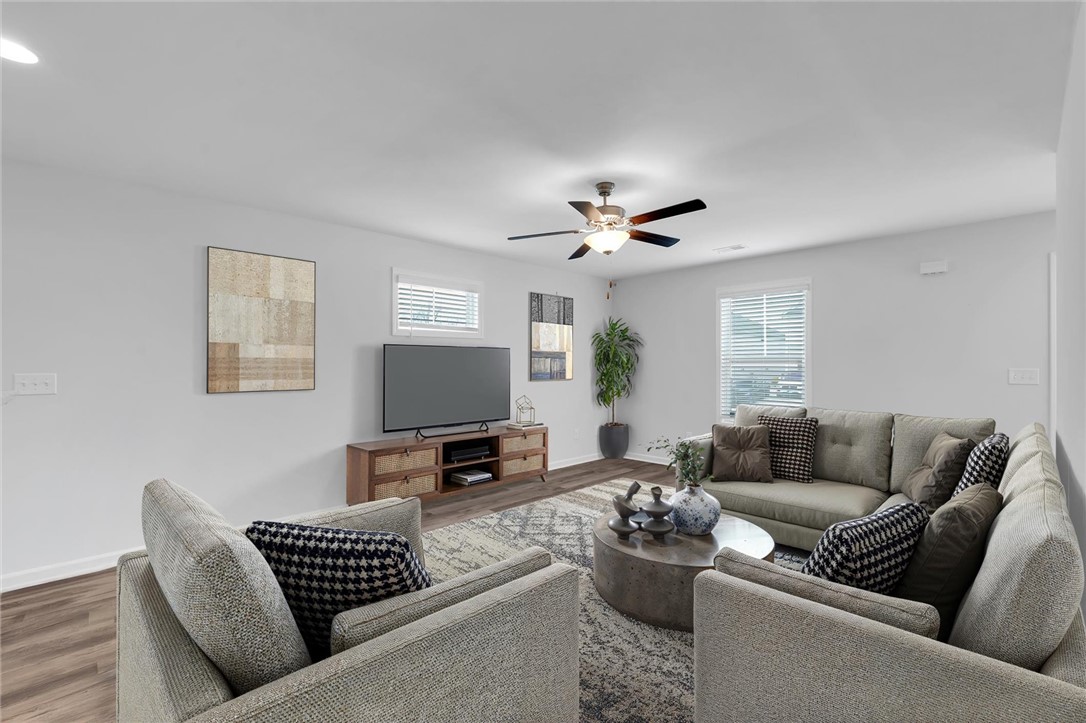 215 Royal Way Pendleton, SC 29670 - Photo 2 of 31 This virtually staged inviting living space features warm flooring and ample natural light, perfect for everyday living.