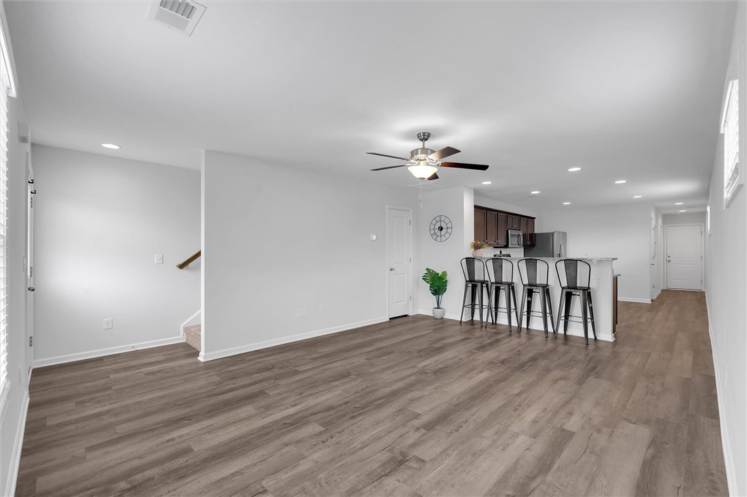 215 Royal Way Pendleton, SC 29670 - Photo 4 of 31 This inviting open-concept living area seamlessly connects to the kitchen, creating an ideal space for daily living.