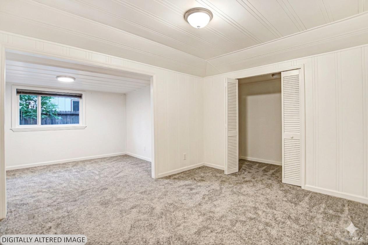 15289 Willow Road Guerneville, CA 95446 - Photo 12 of 22 an empty room with a empty space and windows