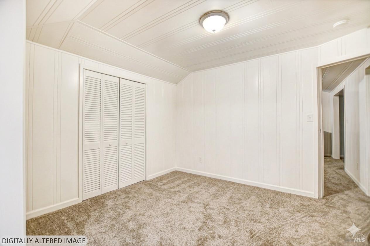 15289 Willow Road Guerneville, CA 95446 - Photo 14 of 22 an empty room with a natural light