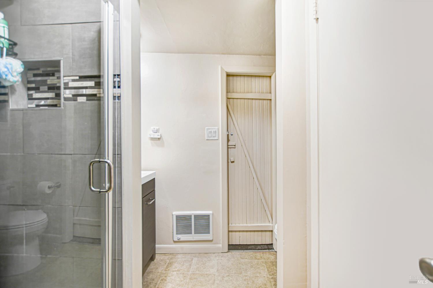 15289 Willow Road Guerneville, CA 95446 - Photo 18 of 22 a bathroom with a shower and toilet