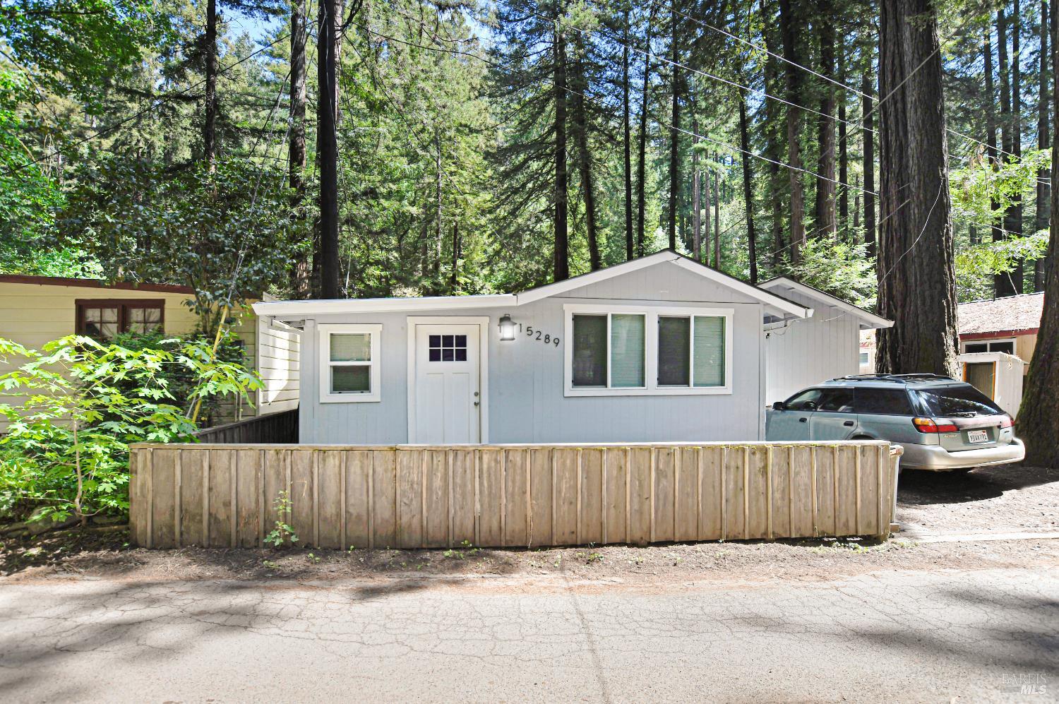 15289 Willow Road Guerneville, CA 95446 - Photo 20 of 22 front view of a house with a small yard