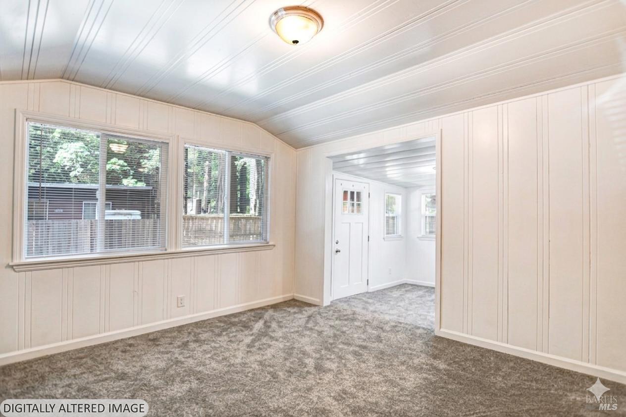 15289 Willow Road Guerneville, CA 95446 - Photo 2 of 22 an empty room with windows