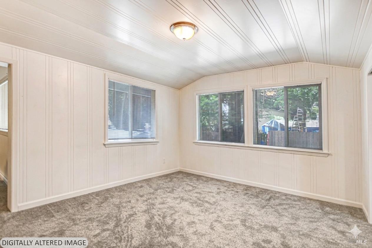 15289 Willow Road Guerneville, CA 95446 - Photo 5 of 22 a view of an empty room with a window