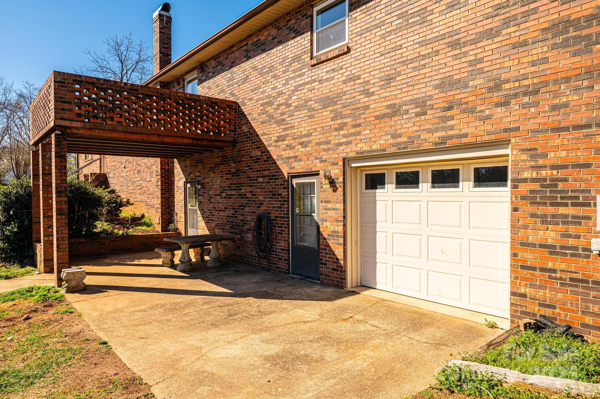 1221 Connelly Springs Road Lenoir, NC 28645 - Photo 14 of 42 a view of a house with a outdoor space
