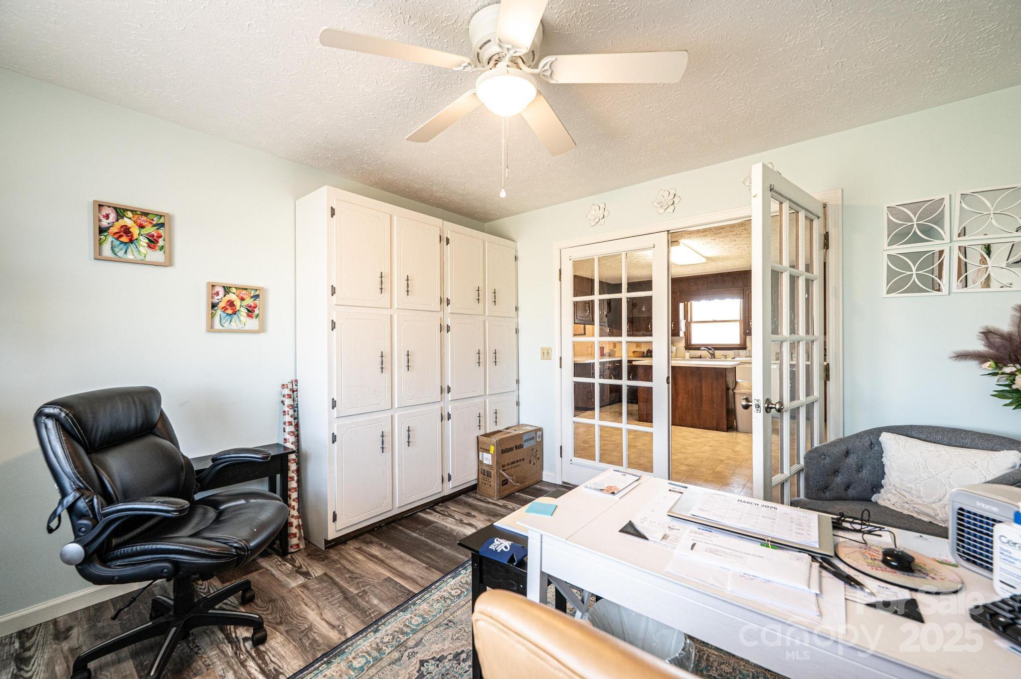 1221 Connelly Springs Road Lenoir, NC 28645 - Photo 28 of 42 a room with a workspace