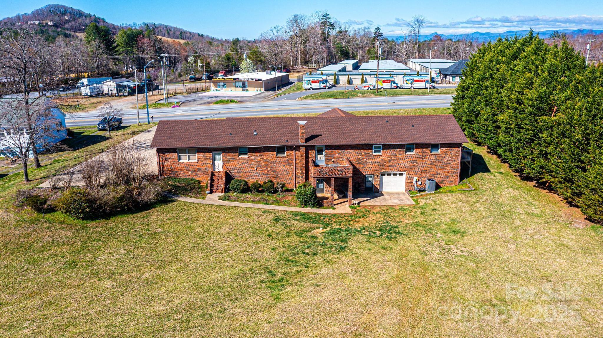 1221 Connelly Springs Road Lenoir, NC 28645 - Photo 3 of 42 a view of a basket ball ground