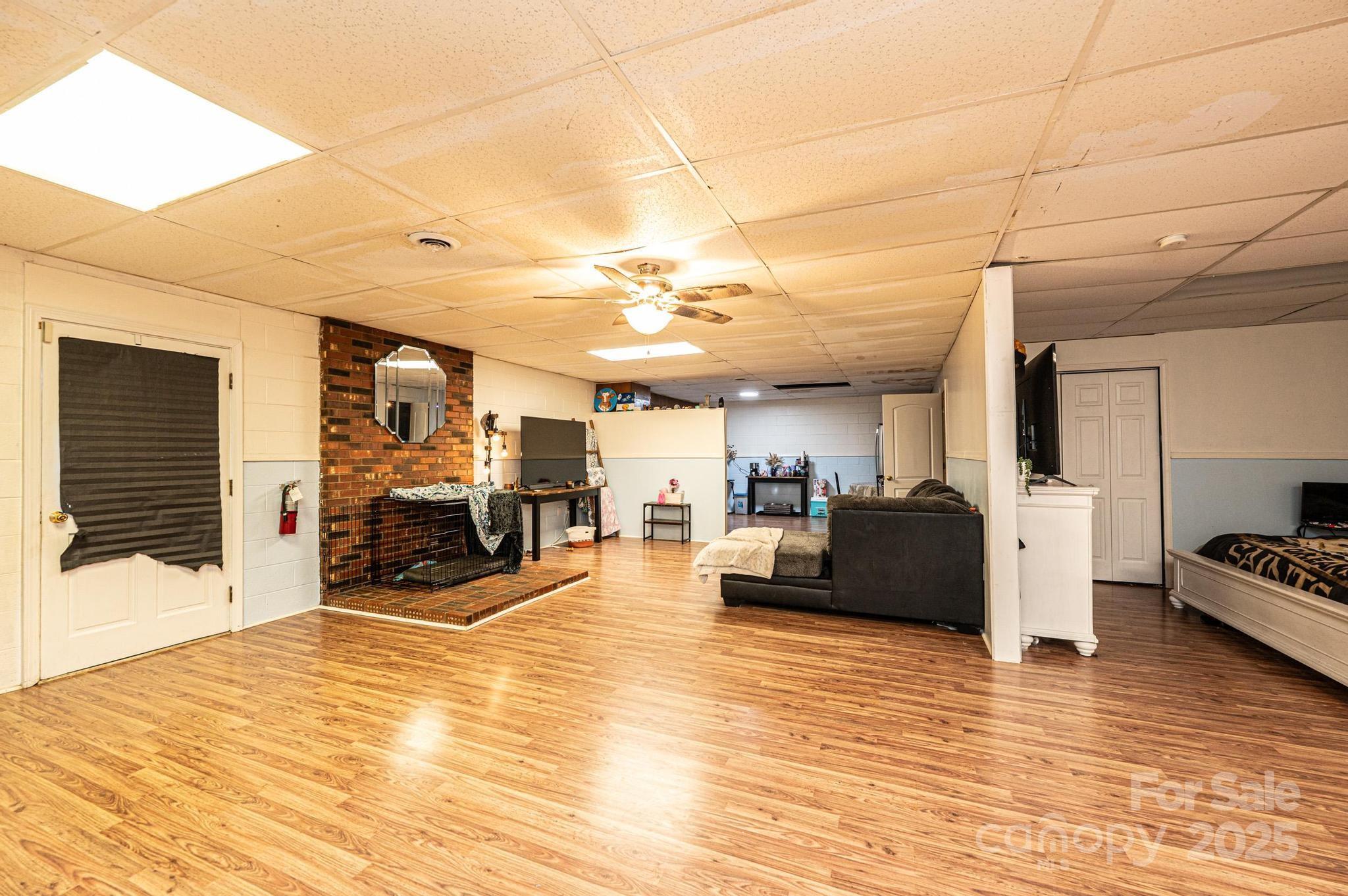 1221 Connelly Springs Road Lenoir, NC 28645 - Photo 40 of 42 a view of a living room kitchen and dining room