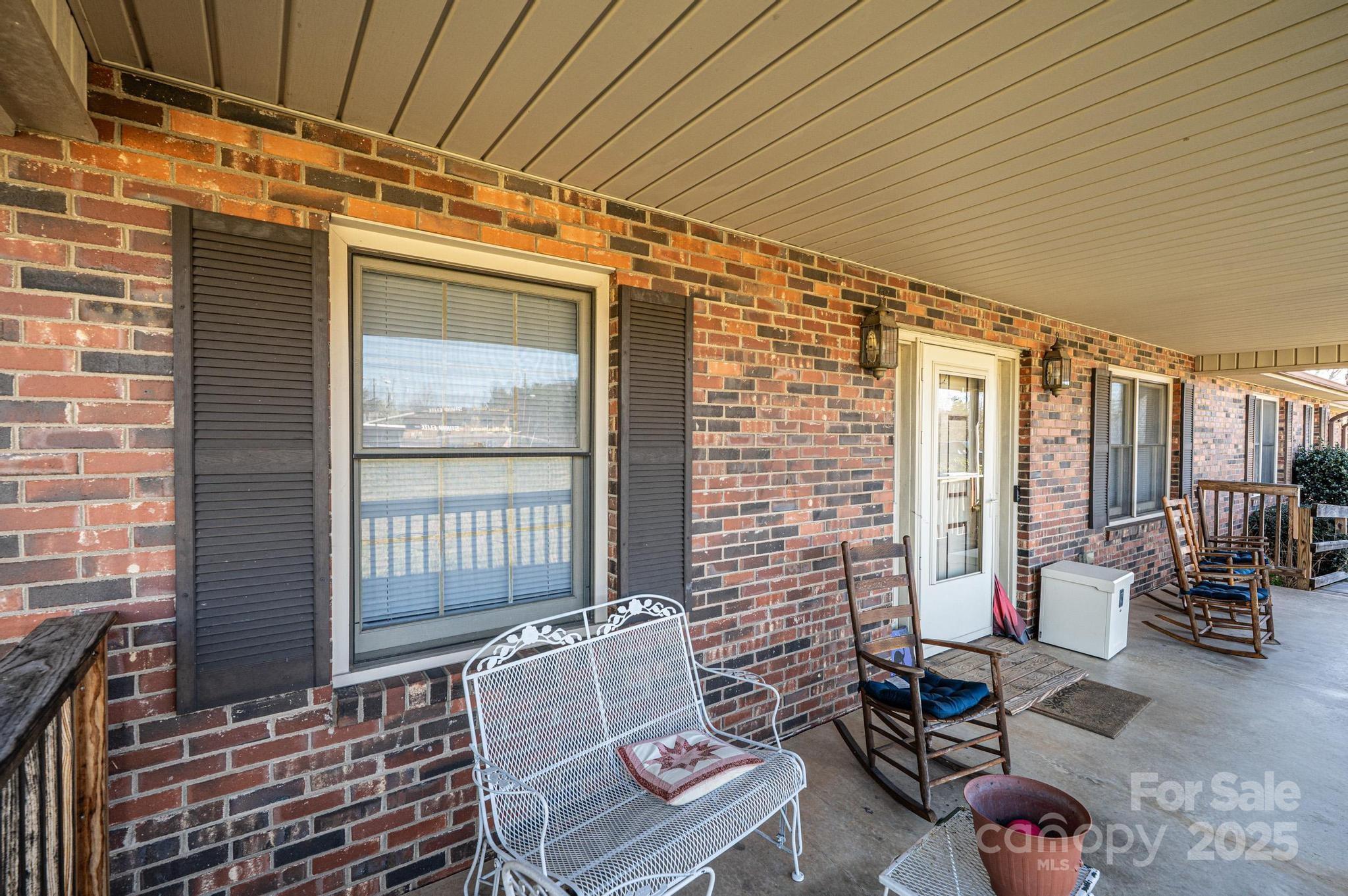 1221 Connelly Springs Road Lenoir, NC 28645 - Photo 8 of 42 a outdoor space with patio