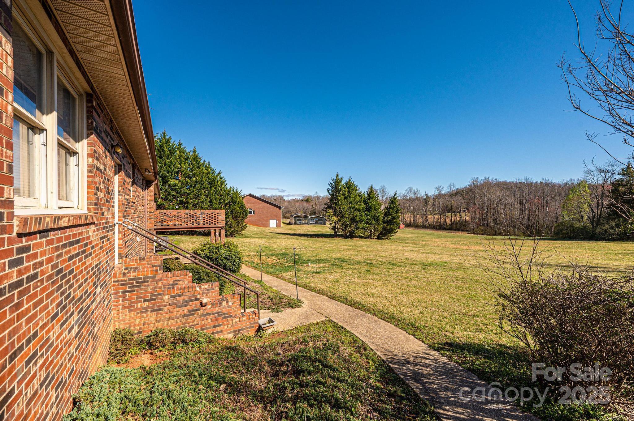 1221 Connelly Springs Road Lenoir, NC 28645 - Photo 10 of 42 a view of an ocean & house