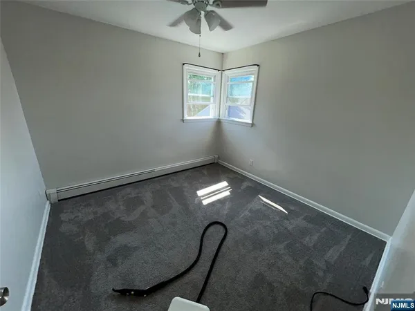 a room with lots of chandelier fan