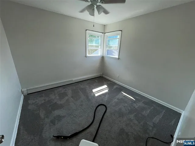 a room with lots of chandelier fan