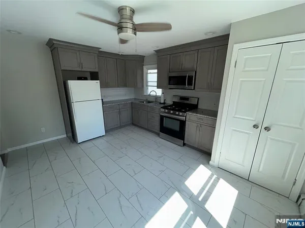 a view of hallway with closet