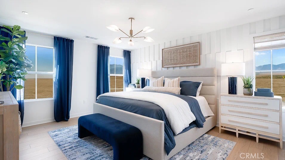 1708 Eagle Road Rialto, CA 92376 - Photo 15 of 23 a bedroom with a large bed and a window