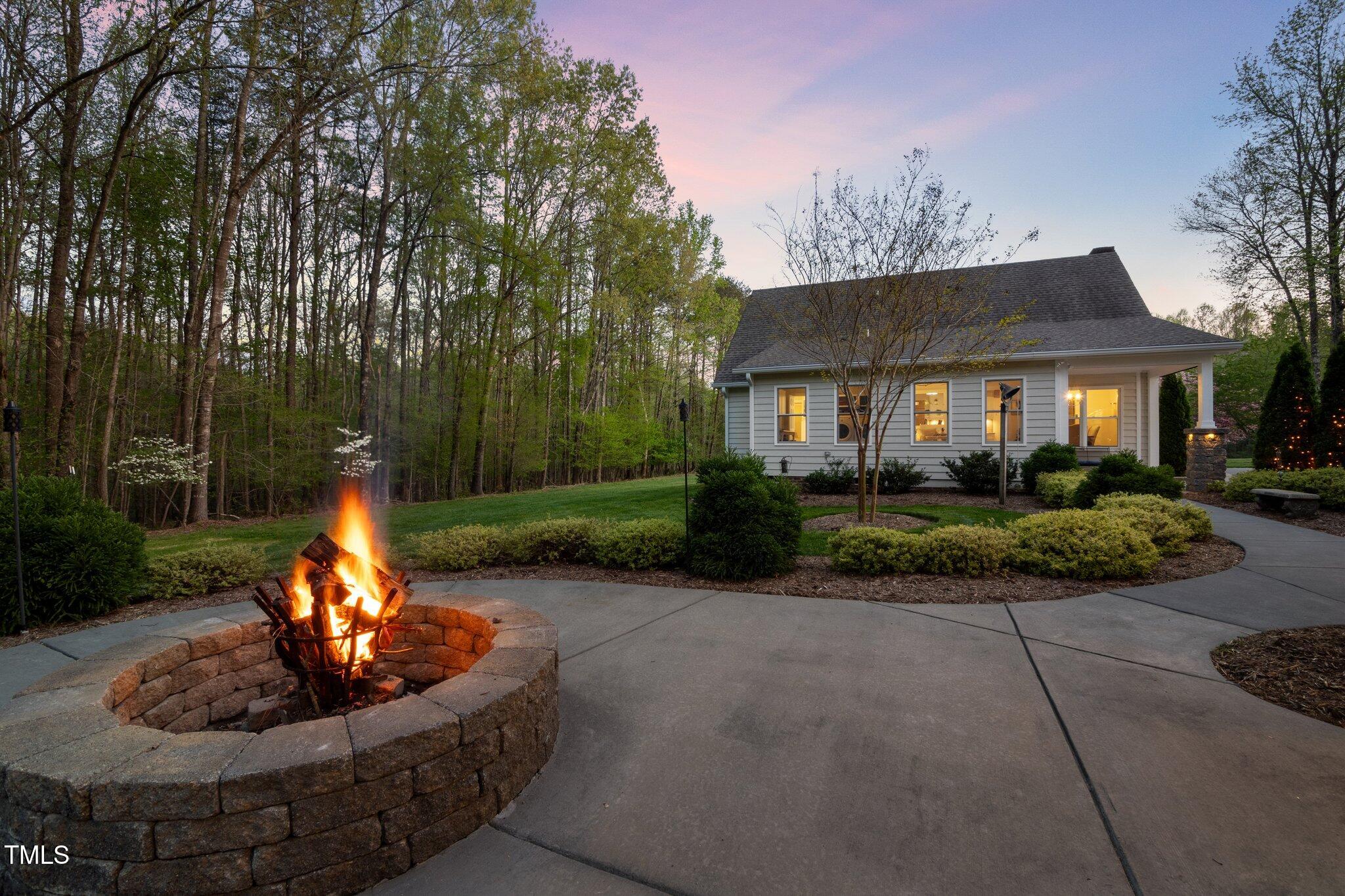 2259 Helena Moriah Road Timberlake, NC 27583 - Photo 38 of 49 Courtyard firepit