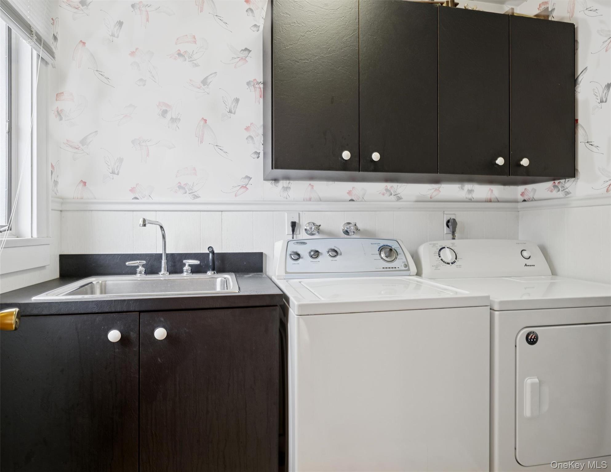 148 Woodhull Avenue Riverside, NY 11901 - Photo 20 of 20 a utility room with dryer and washer
