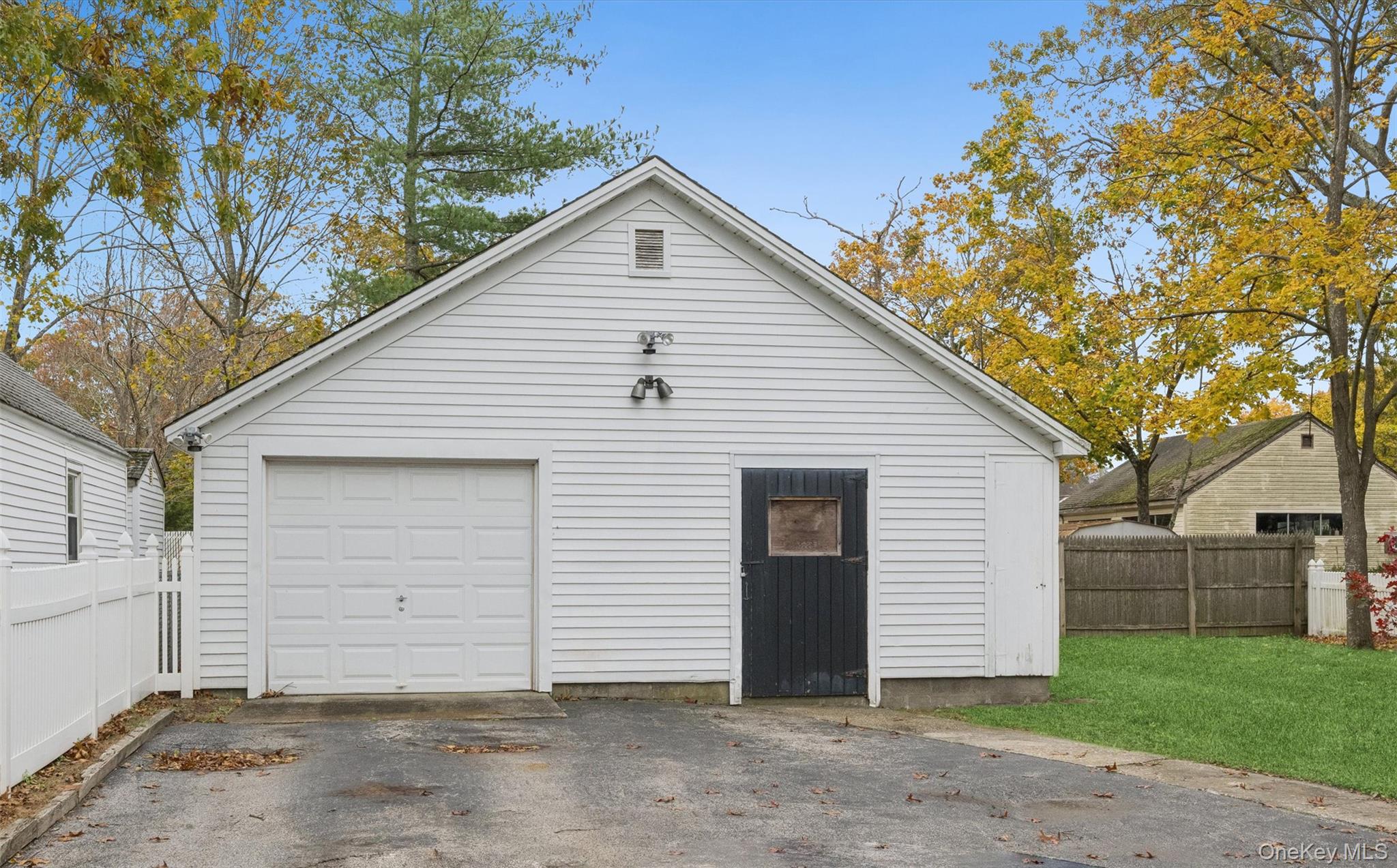 148 Woodhull Avenue Riverside, NY 11901 - Photo 3 of 20 a view of a house with a yard