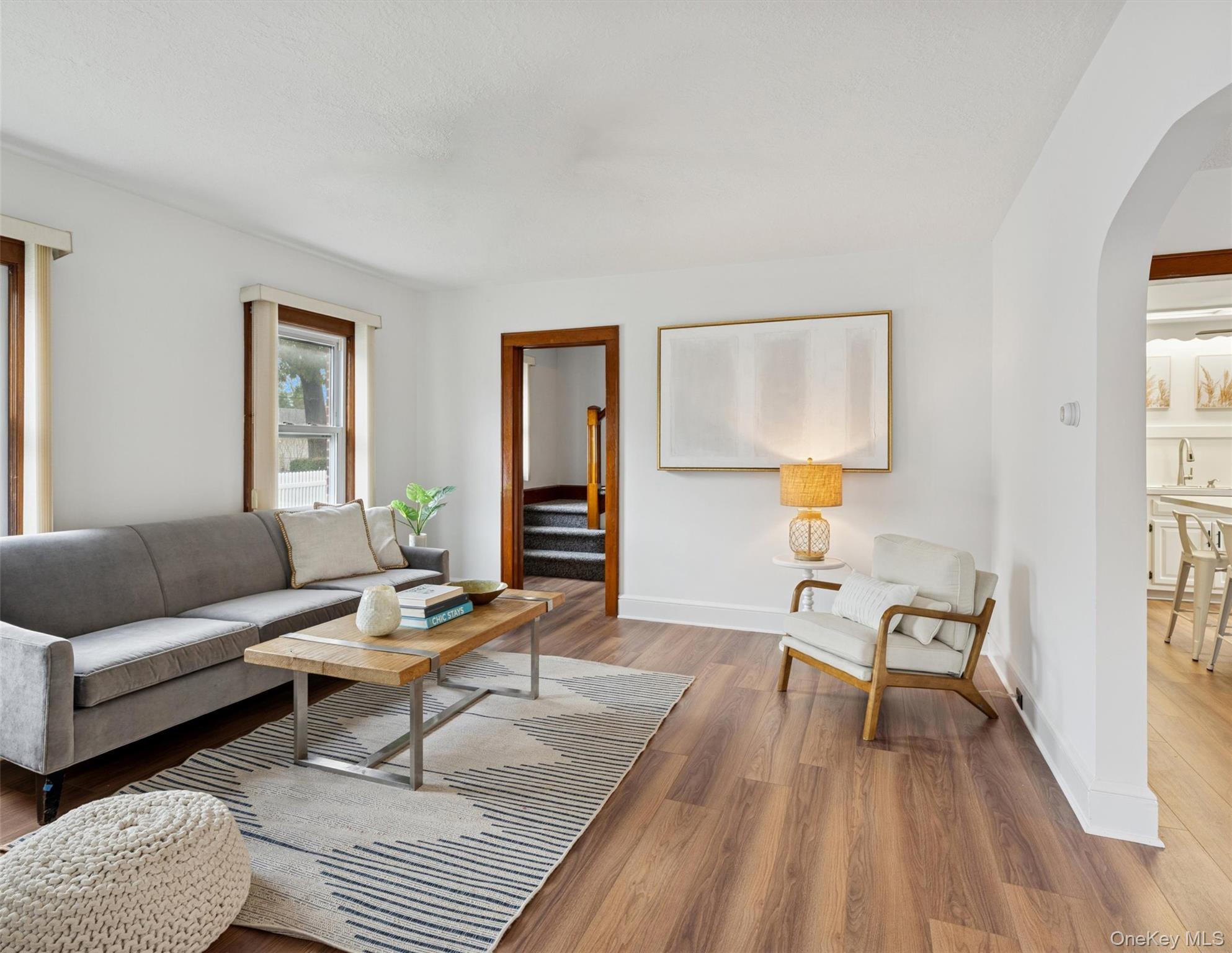 148 Woodhull Avenue Riverside, NY 11901 - Photo 6 of 20 a living room with furniture and a table