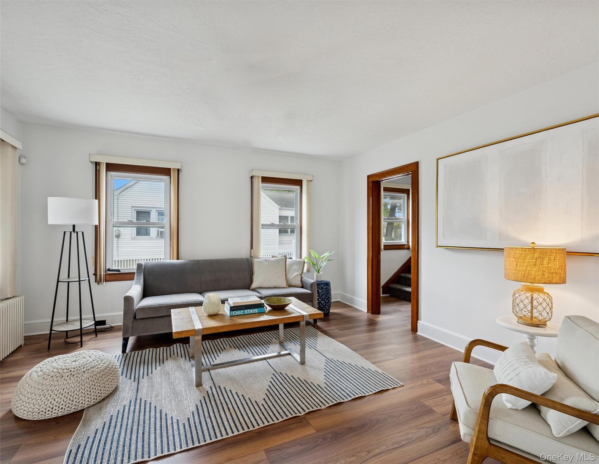 148 Woodhull Avenue Riverside, NY 11901 - Photo 9 of 20 a living room with furniture rug and wooden floor