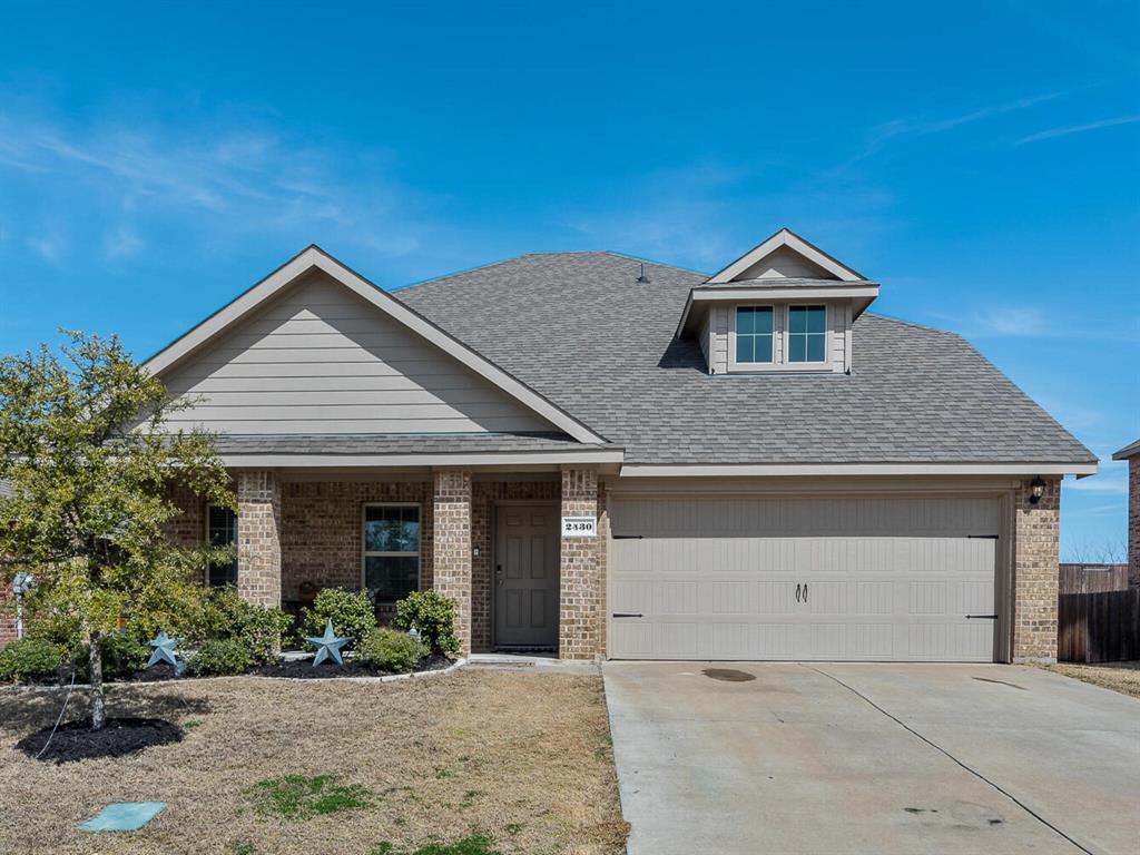 2430 Willard Way Forney, TX 75126 - Photo 1 of 1 a front view of a house with a yard