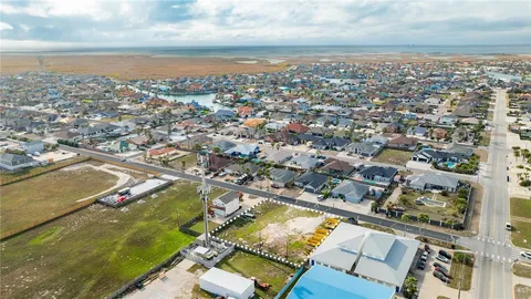 an aerial view of a residential building with outdoor space
