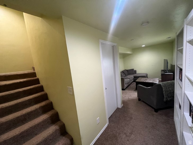297 West Bricker Road Draper, UT 84020 - Photo 20 of 25 Carpeted staircase descending into a finished lower level