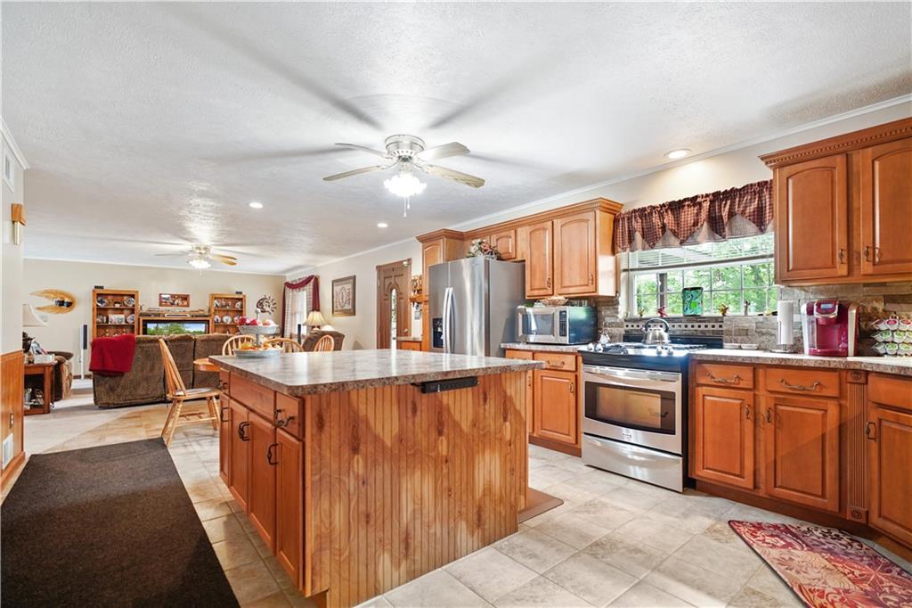 2329 Dinner Bell - 5 Forks Road Farmington, PA 15437 - Photo 5 of 25 View from Kitchen to the Living area.