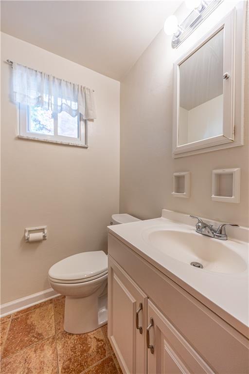 103 Cherry Valley Road Pittsburgh, PA 15221 - Photo 12 of 29 a bathroom with a sink and a toilet