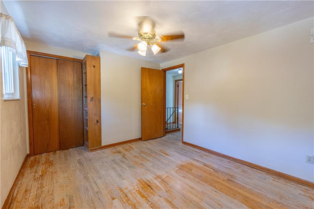 103 Cherry Valley Road Pittsburgh, PA 15221 - Photo 24 of 29 a view of a livingroom with a chandelier fan