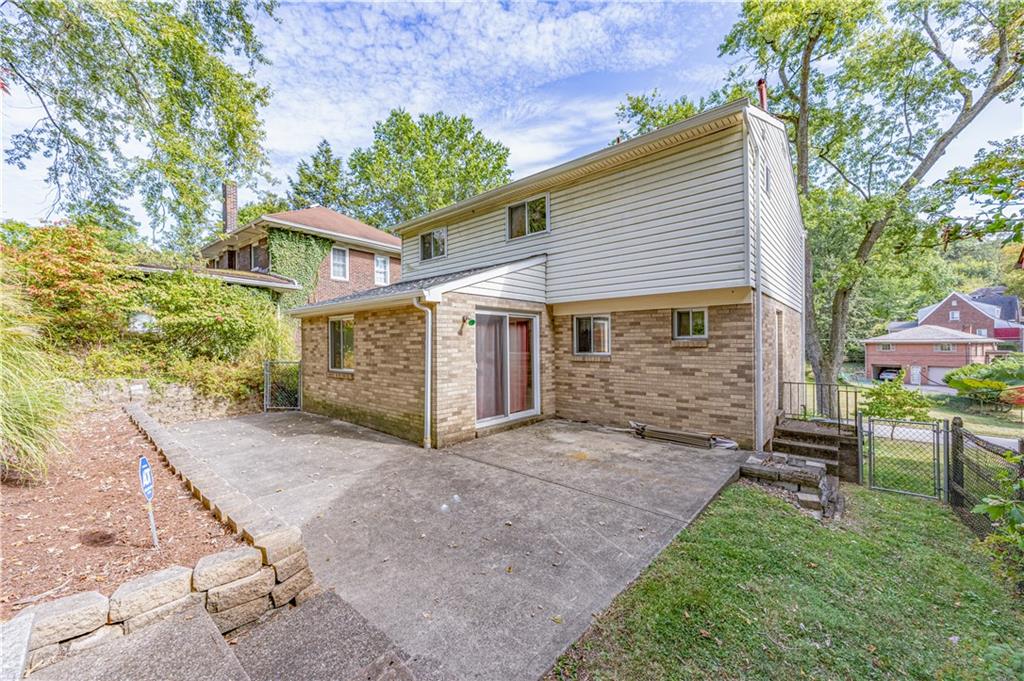 103 Cherry Valley Road Pittsburgh, PA 15221 - Photo 26 of 29 a view of a house with a yard