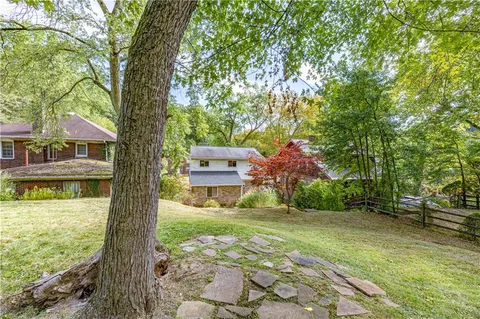 a view of house with outdoor space