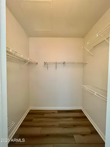 a view of a room with racks on the wall