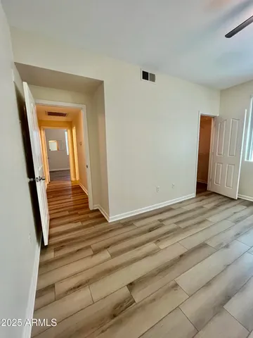 a view of wooden floor and staircase