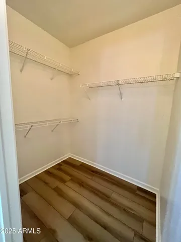 a view of a room with racks on the wall