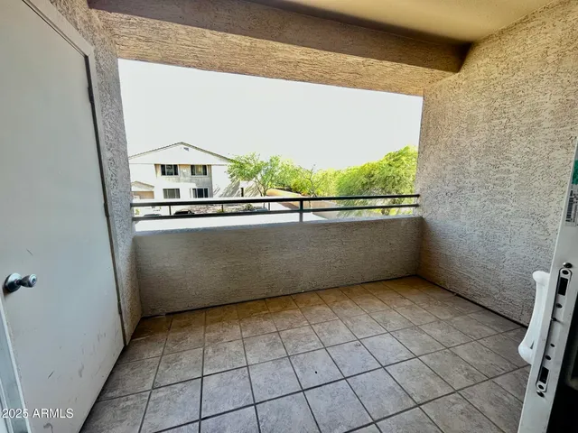 a view of a floor to ceiling window with a sink