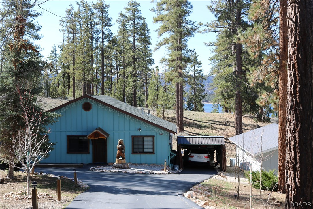 39665 Flicker Road Fawnskin, CA 92333 - Photo 19 of 29 a front view of a house with a yard