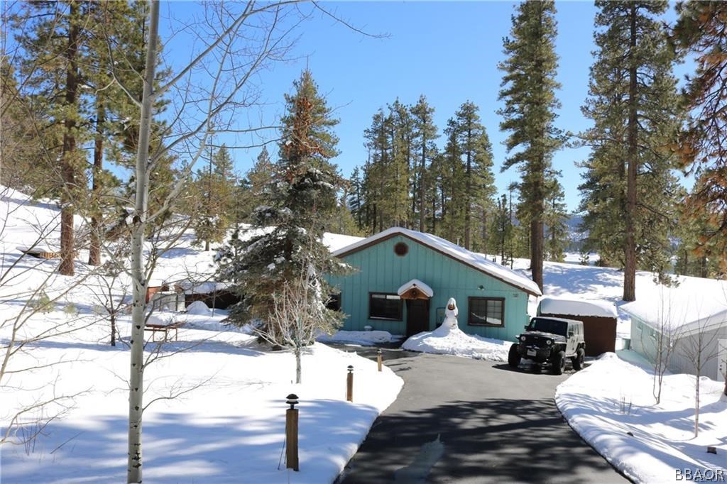 39665 Flicker Road Fawnskin, CA 92333 - Photo 29 of 29 a house with trees in the background