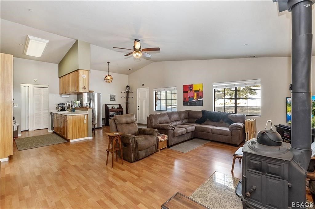 39665 Flicker Road Fawnskin, CA 92333 - Photo 5 of 29 a living room with furniture kitchen view and a window