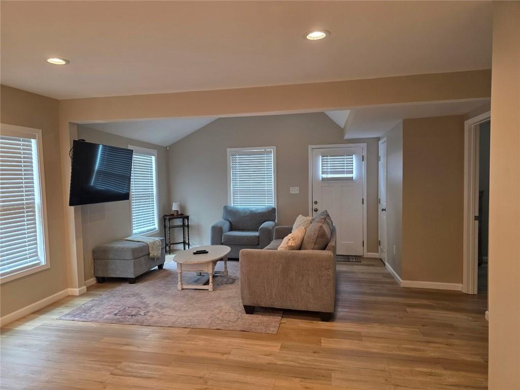 722 Lacy Street Monroe, GA 30655 - Photo 4 of 19 a living room with furniture and a window