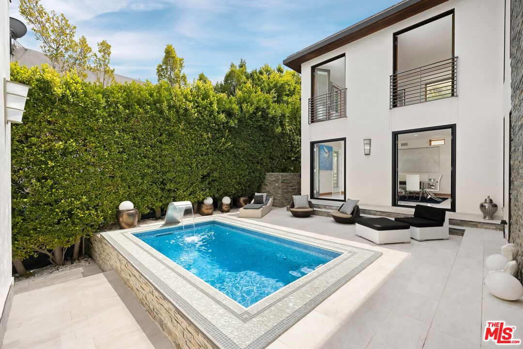 2437 Apollo Drive Los Angeles, CA 90046 - Photo 2 of 27 a view of swimming pool with outdoor seating