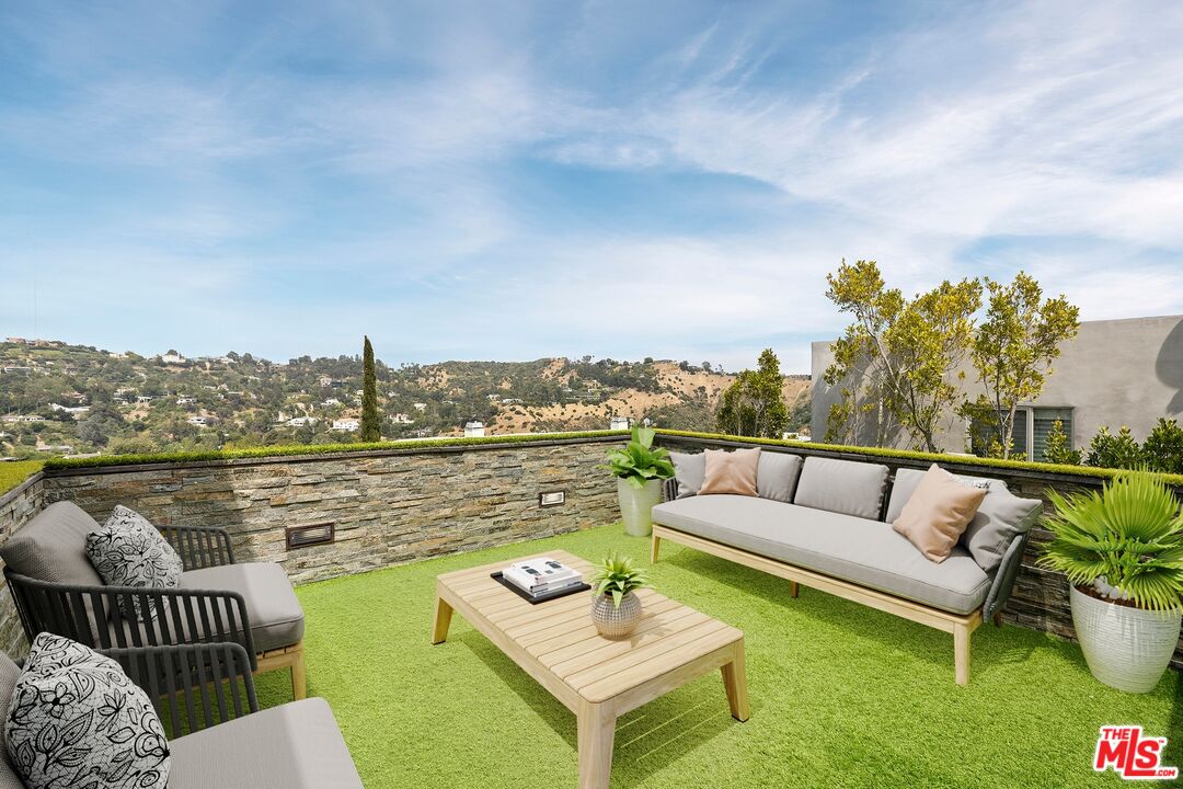 2437 Apollo Drive Los Angeles, CA 90046 - Photo 21 of 27 a view of a lake with couches and city view
