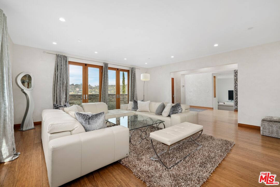 2437 Apollo Drive Los Angeles, CA 90046 - Photo 4 of 27 a living room with furniture and a large window