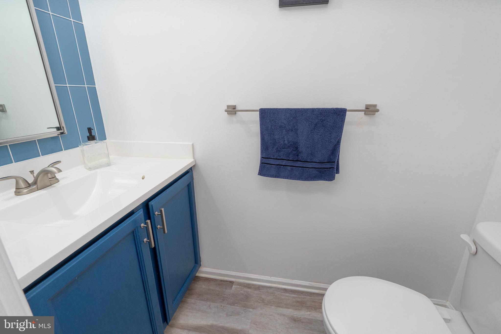 104 Bradbury Road Brookhaven, PA 19015 - Photo 13 of 29 a bathroom with a sink vanity and a toilet